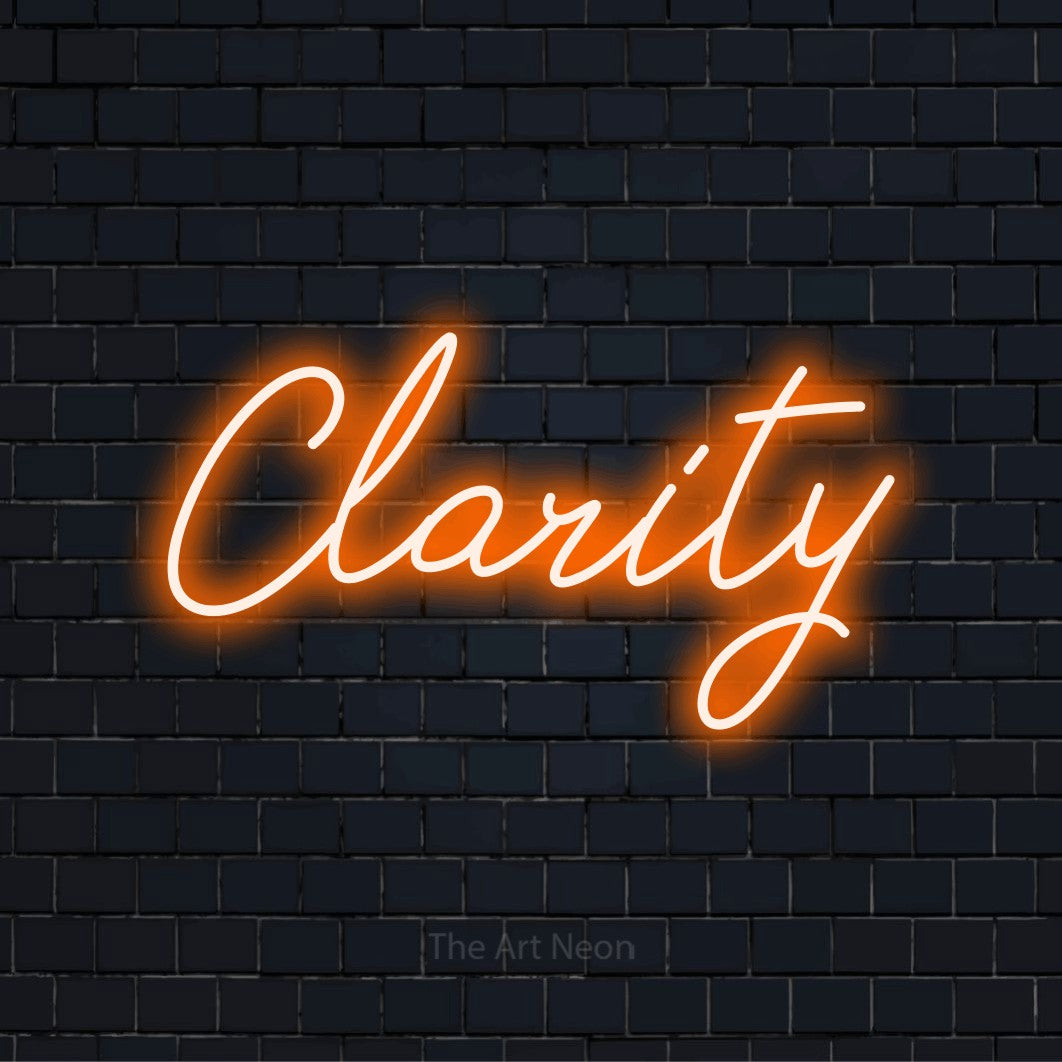 "Clarity" LED neon sign on a black brick wall