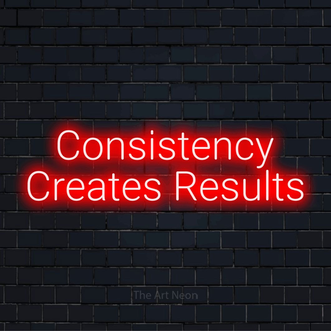 "Consistency Creates Results" glowing LED neon sign on a black brick wall