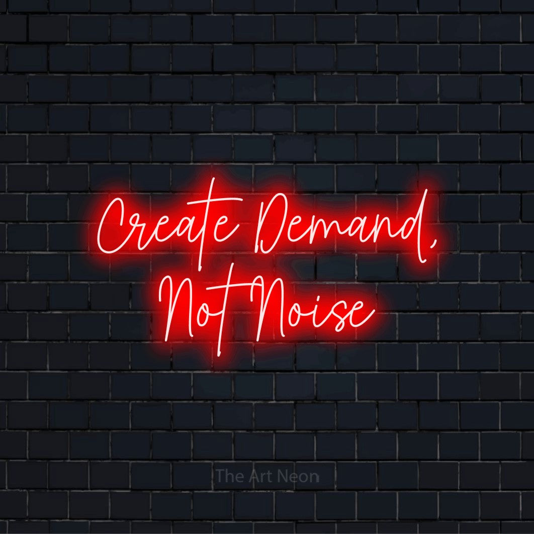 "Create Demand, Not Noise" neon text design on a black brick wall