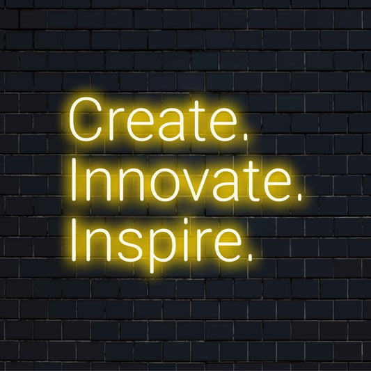 Create Innovate Inspire Neon Light with bright LED glow on dark brick background