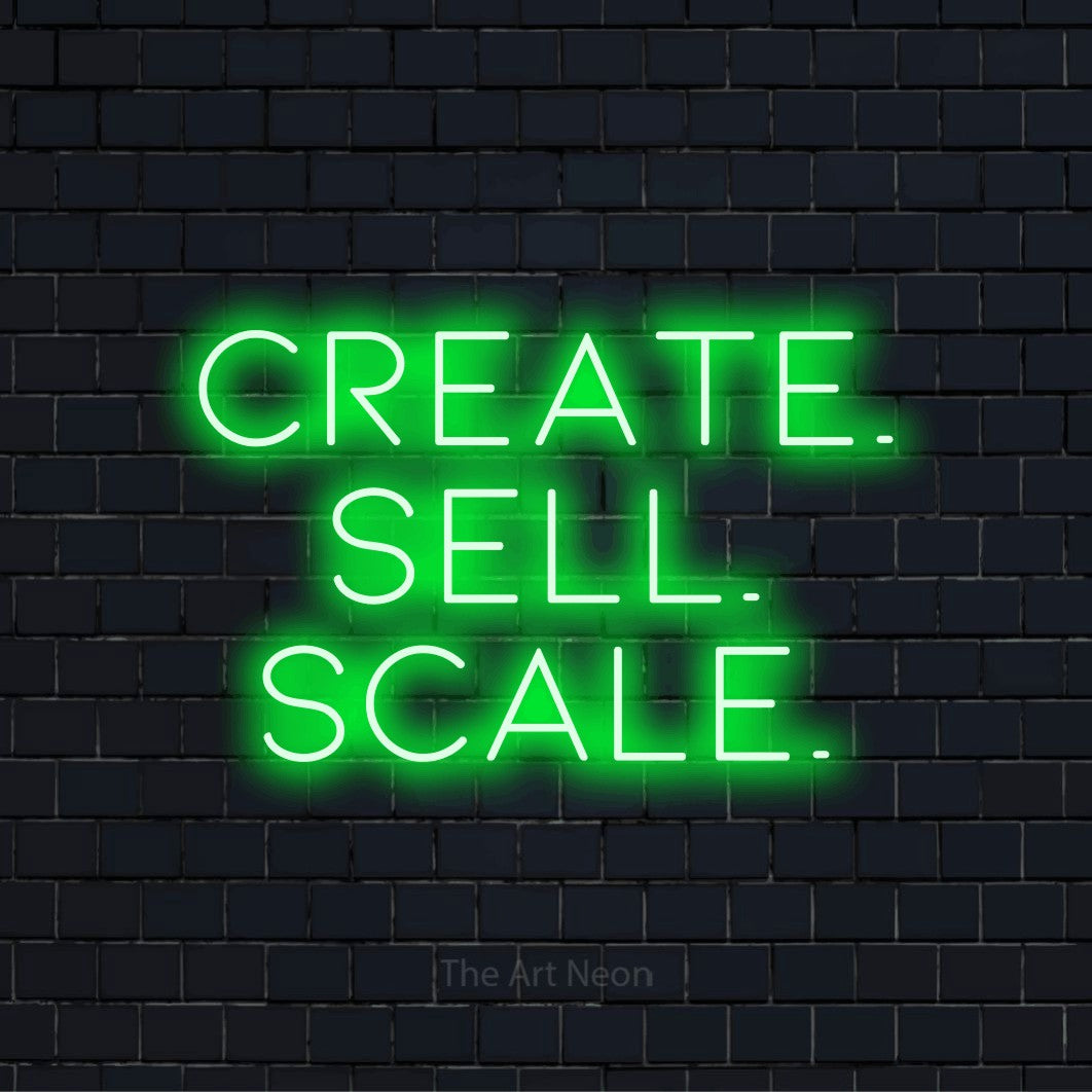 "Create. Sell. Scale." LED neon sign on a black brick wall