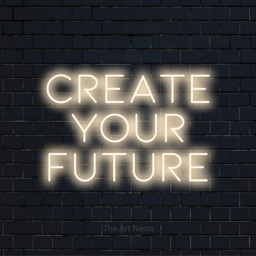 "Create Your Future" glowing LED neon sign on a black brick wall