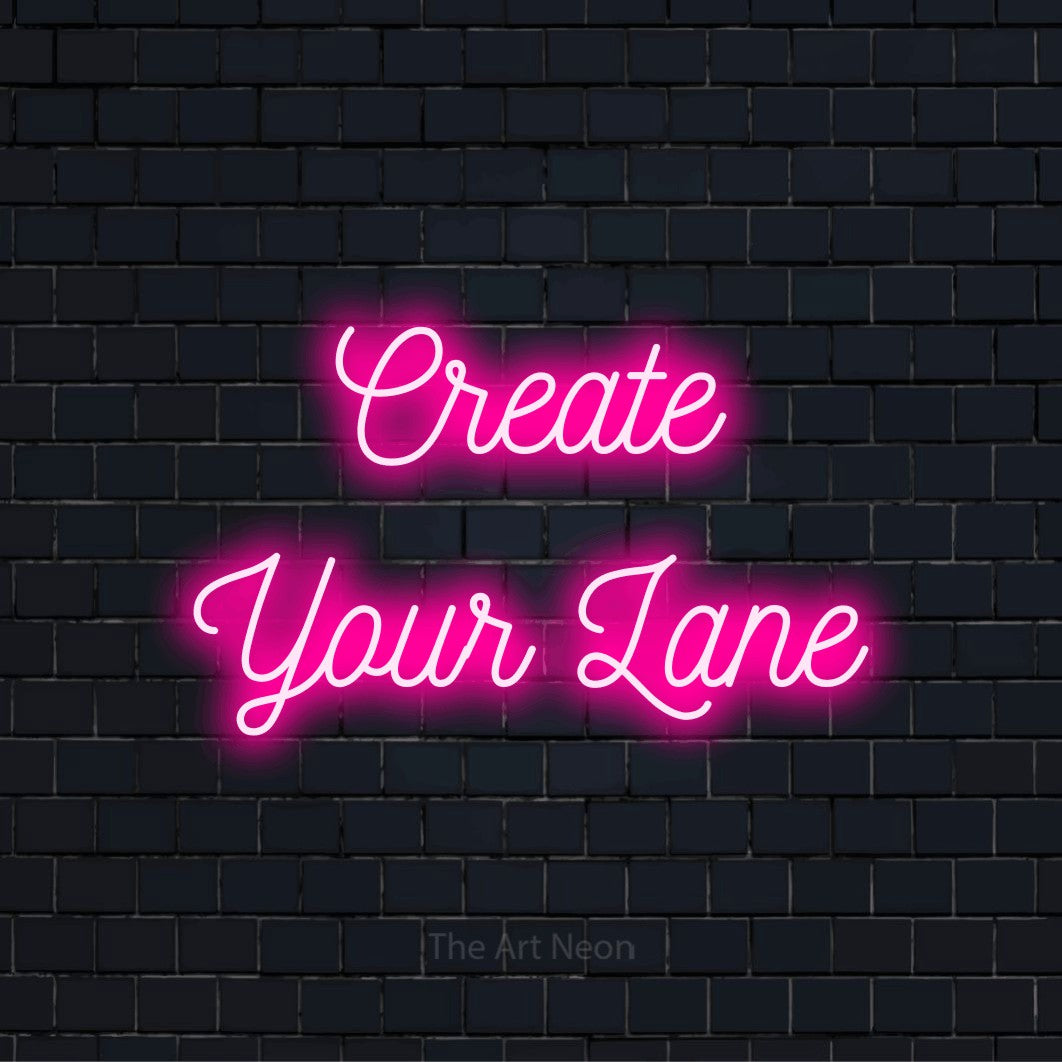 "Create Your Lane" glowing LED neon sign on a black brick wall