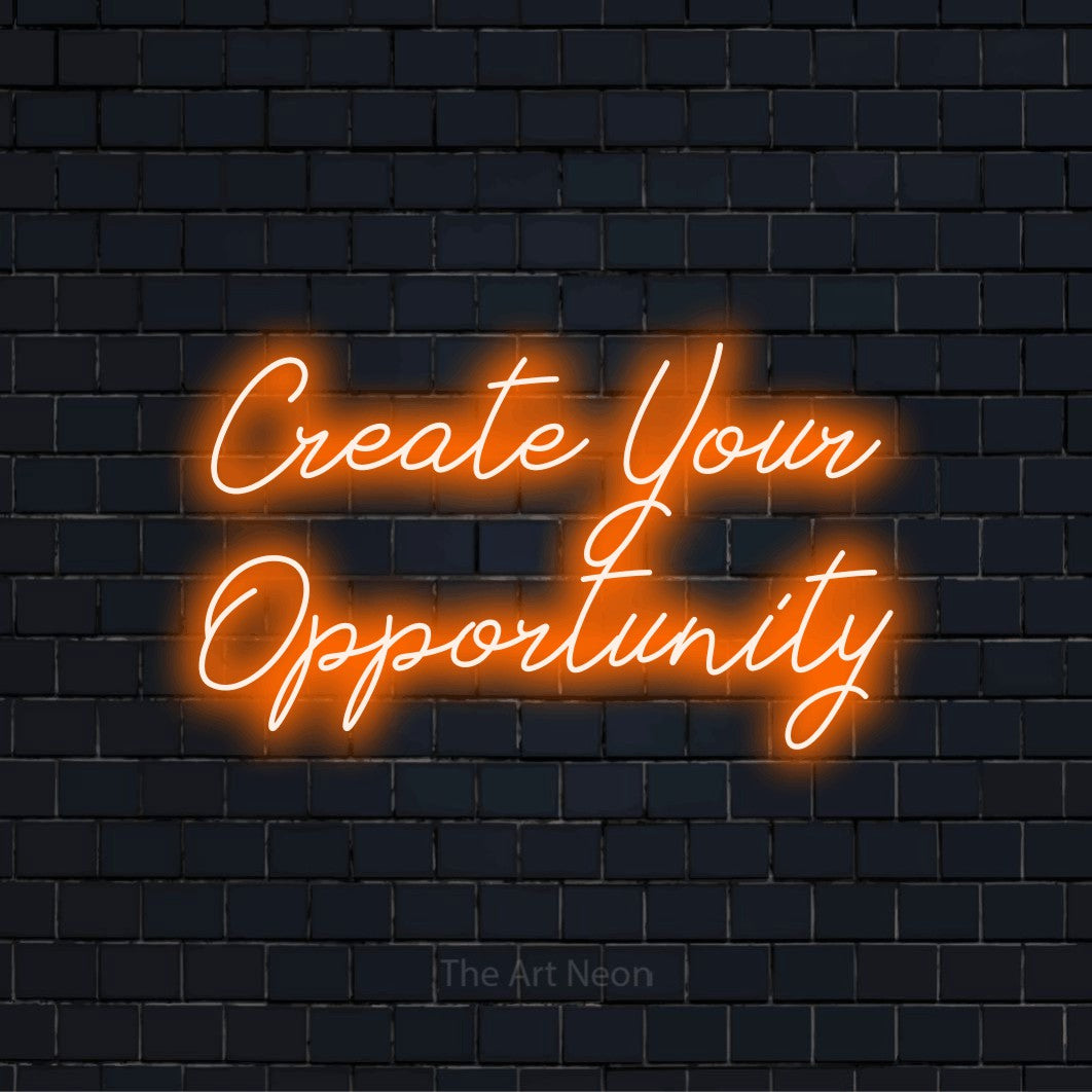 "Create Your Opportunity" neon text design on a black brick wall