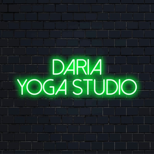 Daria Yoga Studio Custom Name Neon Sign, glowing neon text on black brick background