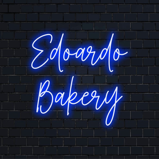 Edoardo Bakery Personalized Neon Light with bright LED glow on black brick background