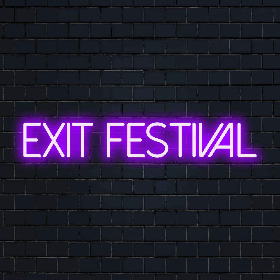 Exit Festival Neon Light with glowing lettering on dark brick background