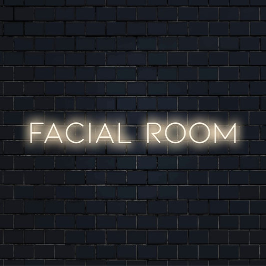 Facial Room LED Neon Sign, glowing neon text on black brick background