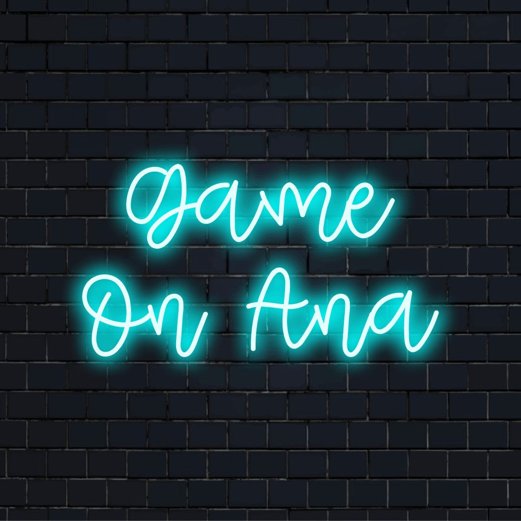 Game On Ana Custom Name Neon Sign, bright neon lettering on dark brick background