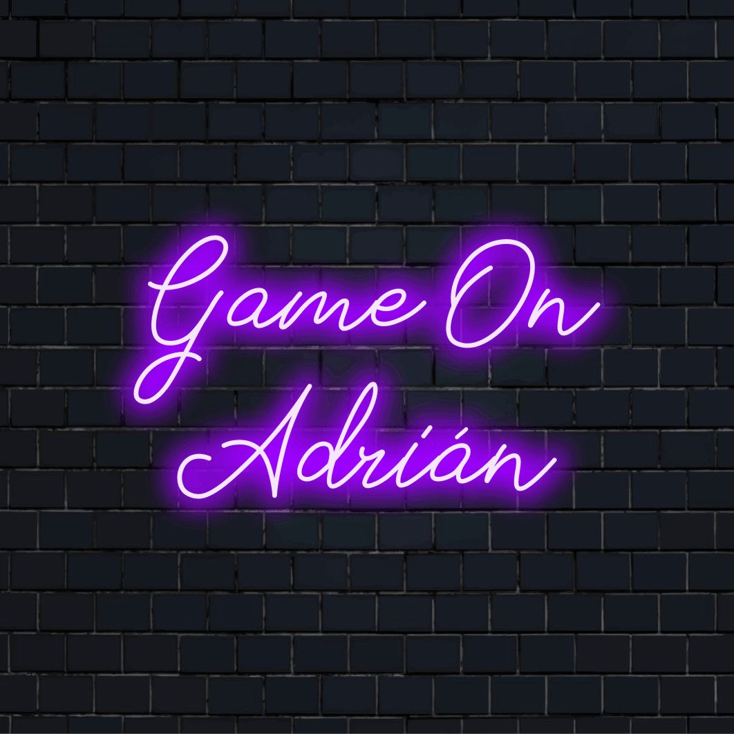 Game On Adrian Custom Name Neon Sign, neon text light on dark brick background