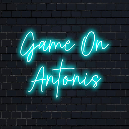 Game On Antonis Custom Name Neon Sign, neon text light on black brick background