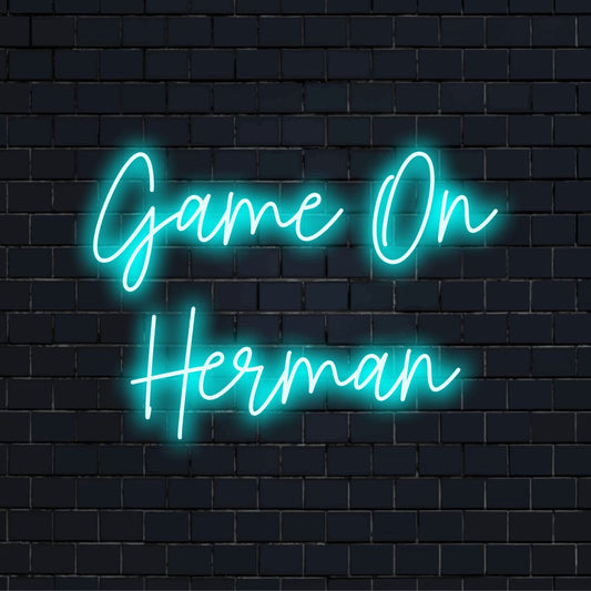 Game On Herman Custom Name Neon Sign, soft neon glow against black brick wall