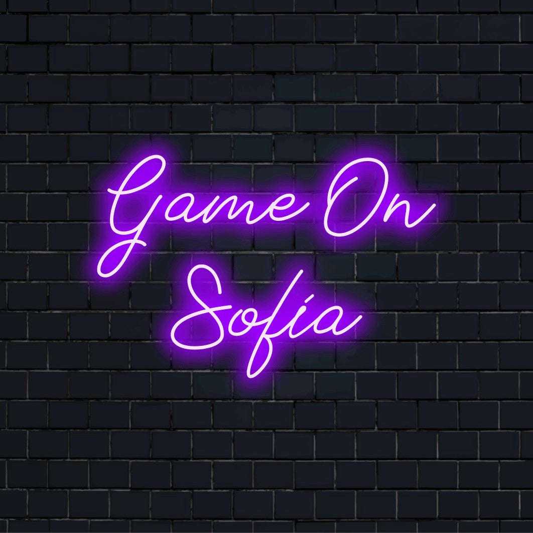 Game On Sofia Personalized Neon Light with bright LED glow on dark brick background