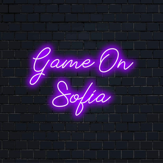 Game On Sofia Personalized Neon Light with bright LED glow on dark brick background