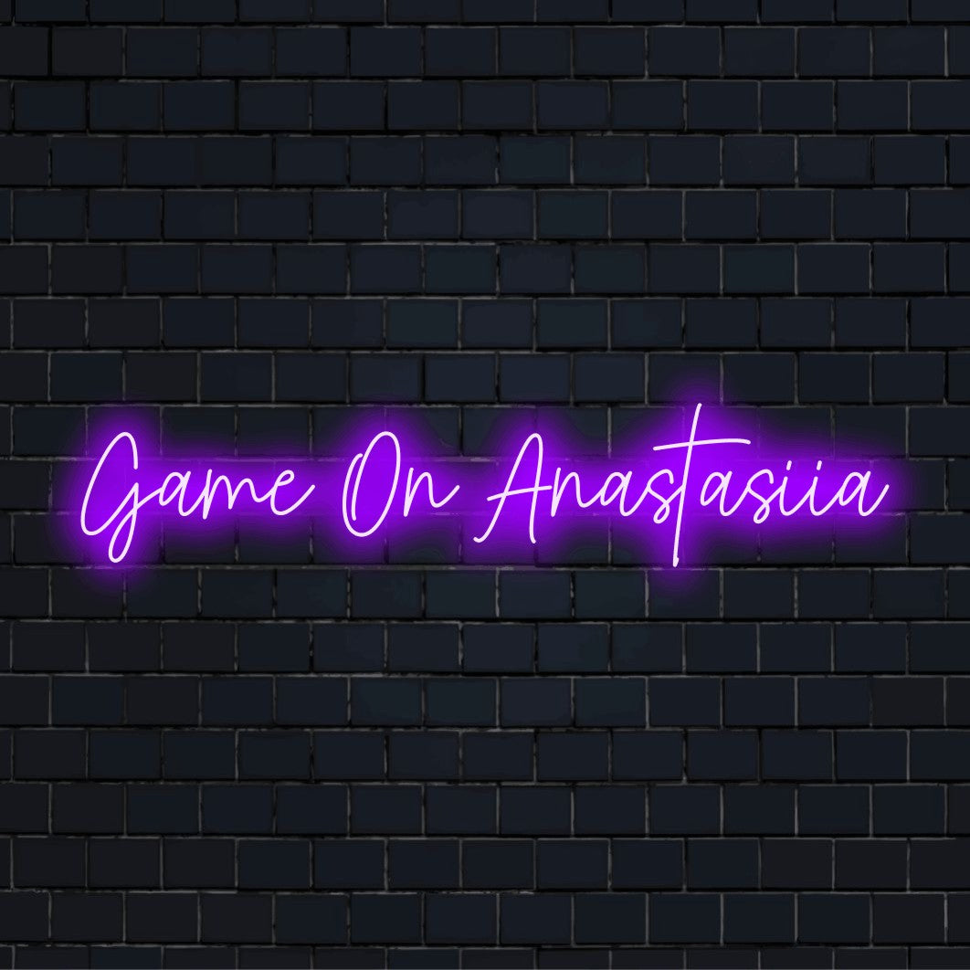 Game On Anastasiia Personalized Neon Light with glowing lettering against brick backdrop