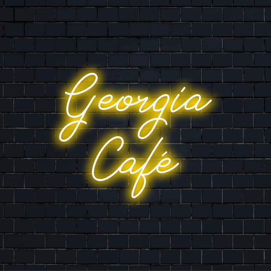 Georgia Cafe Personalized LED Neon Sign, bright neon glow against brick backdrop