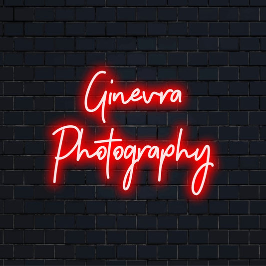 Ginevra Photography Personalized LED Neon Sign, bright neon glow on dark brick wall