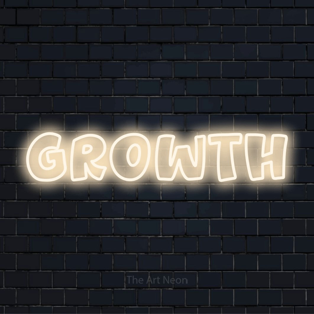"Growth" text design with neon effect on a black brick wall