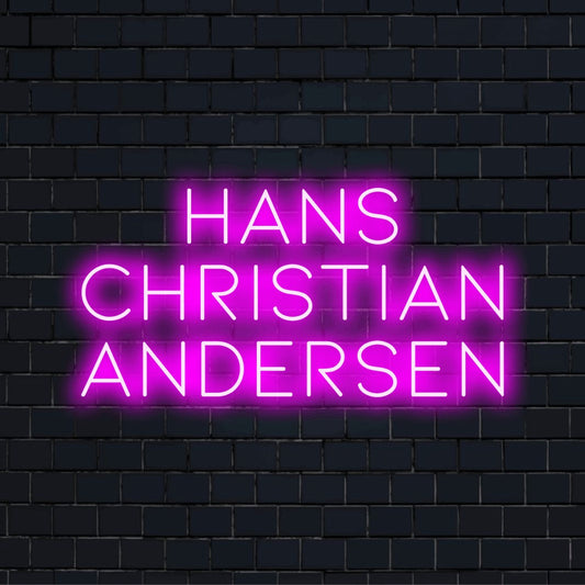 Hans Christian Andersen Neon Light with glowing neon text against black brick wall