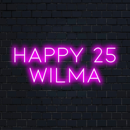 Happy 25 Wilma Custom Name Neon Sign, bright neon lettering against black brick wall