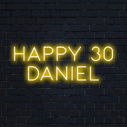 Happy 30 Daniel Personalized LED Neon Sign, bright neon lettering against black brick wall