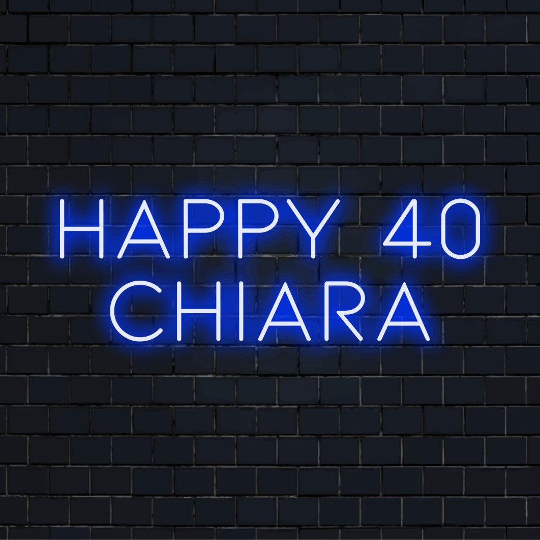 Happy 40 Chiara Personalized LED Neon Sign, glowing lettering against black brick wall