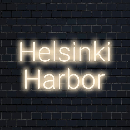 Helsinki Harbor Neon Sign, bright neon lettering against brick backdrop