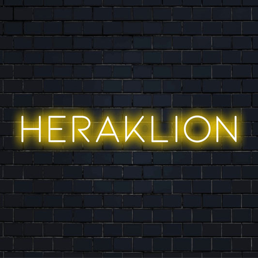 Heraklion Neon Light with glowing lettering on dark brick background