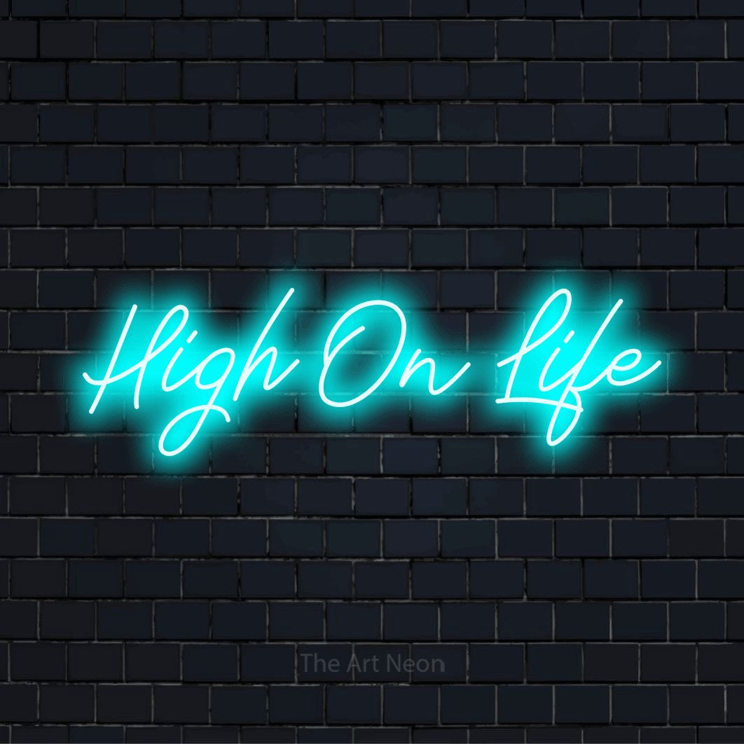 "High On Life" script-style LED neon sign on a black brick wall