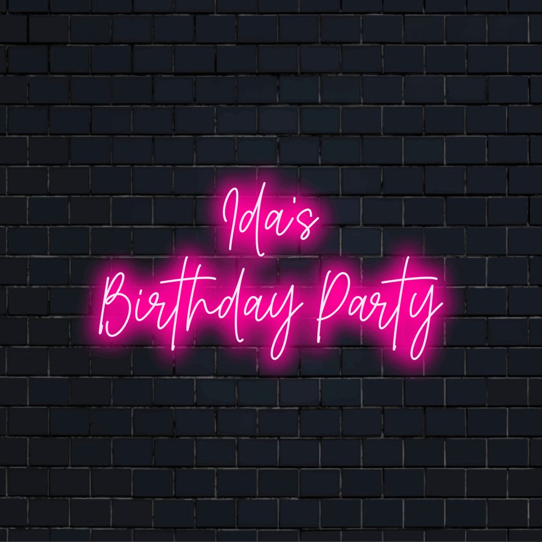 Ida_s Birthday Party Custom Name Neon Sign, bright neon lettering against brick backdrop