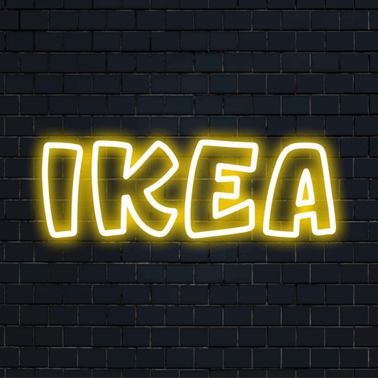Ikea Neon Sign, bright neon lettering on dark brick wall