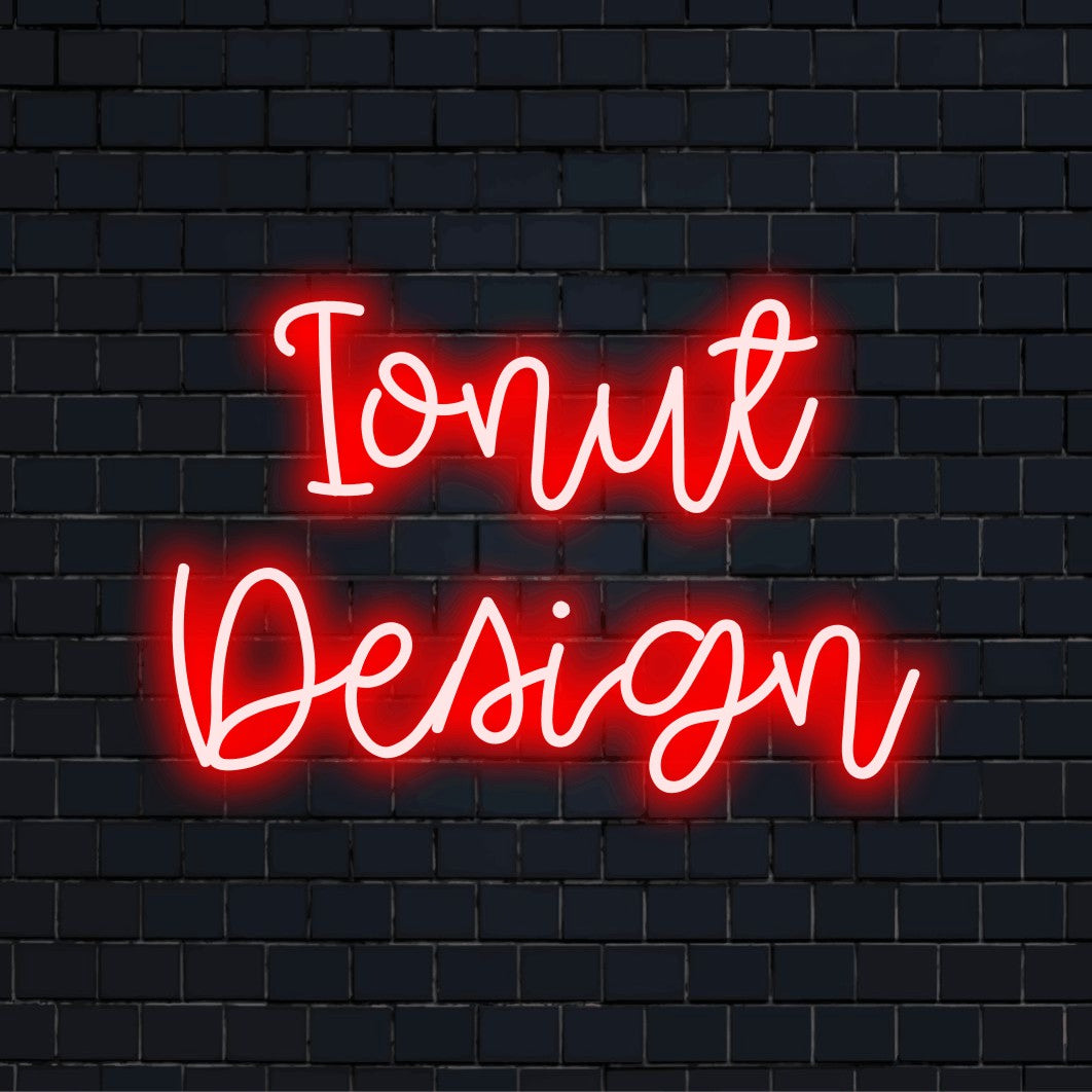 Ionut Design Personalized Neon Light with glowing lettering on dark brick background