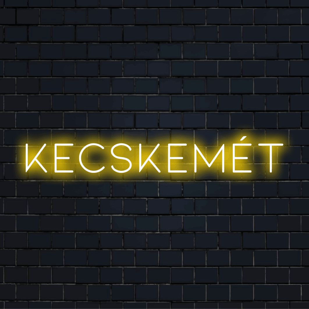 Kecskem T LED Neon Sign, glowing neon text on black brick background