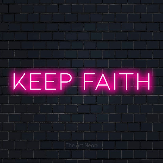 "Keep Faith" script-style LED neon sign on a black brick wall