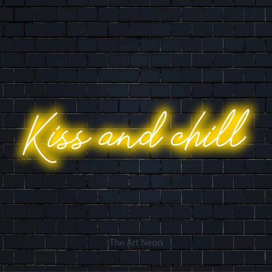 "Kiss And Chill" LED neon sign on a black brick wall