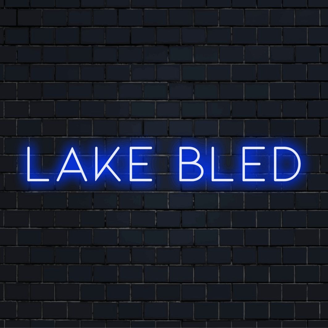 Lake Bled Neon Sign, soft neon glow on dark brick wall