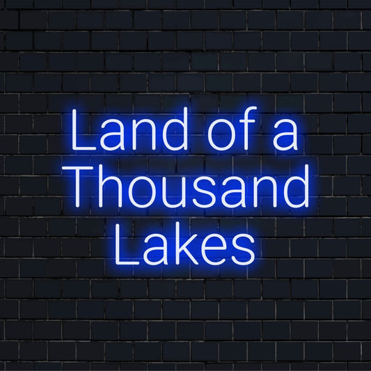 Land Of A Thousand Lakes LED Neon Sign, bright neon lettering against black brick wall