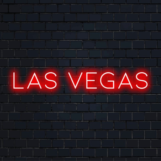 Las Vegas Neon Light with neon text light against brick backdrop
