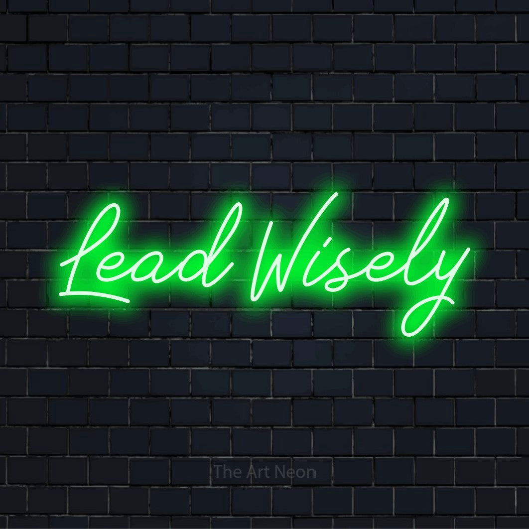 "Lead Wisely" LED neon sign on a black brick wall