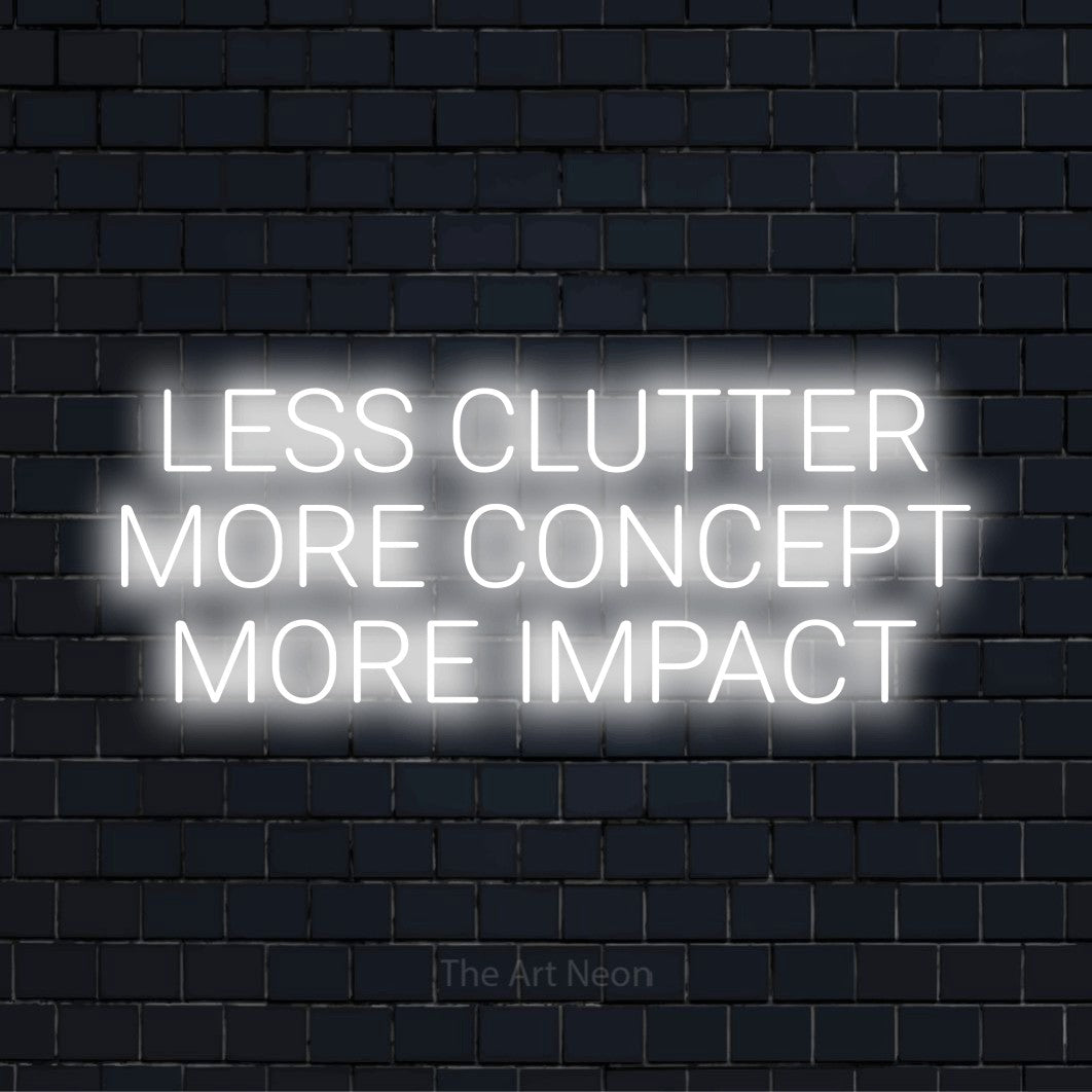 "Less Clutter More Concept More Impact" neon text design on a black brick wall