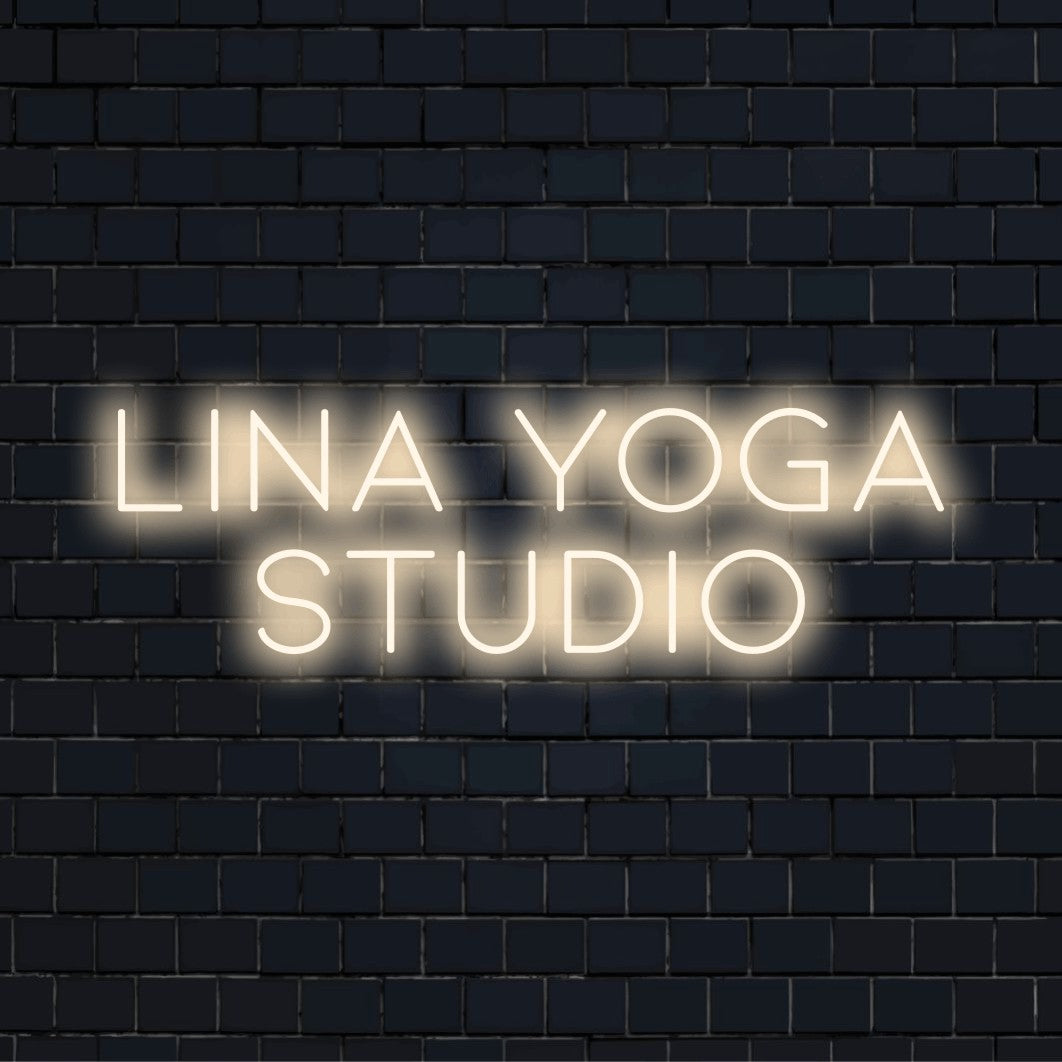 Lina Yoga Studio Personalized LED Neon Sign, glowing wall decor on dark brick background