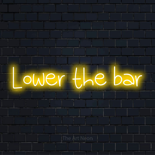 "Lower The Bar" LED neon sign on a black brick wall