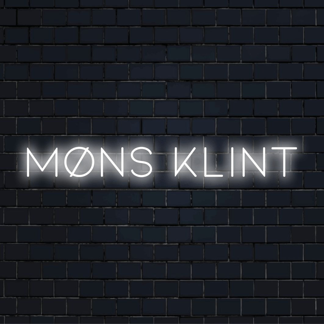 M Ns Klint LED Neon Sign, glowing lettering against brick backdrop