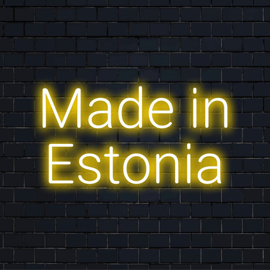 Made In Estonia Neon Light with glowing lettering on dark brick background