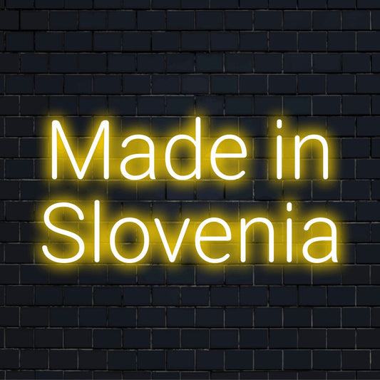 Made In Slovenia Neon Light with soft neon glow on dark brick background
