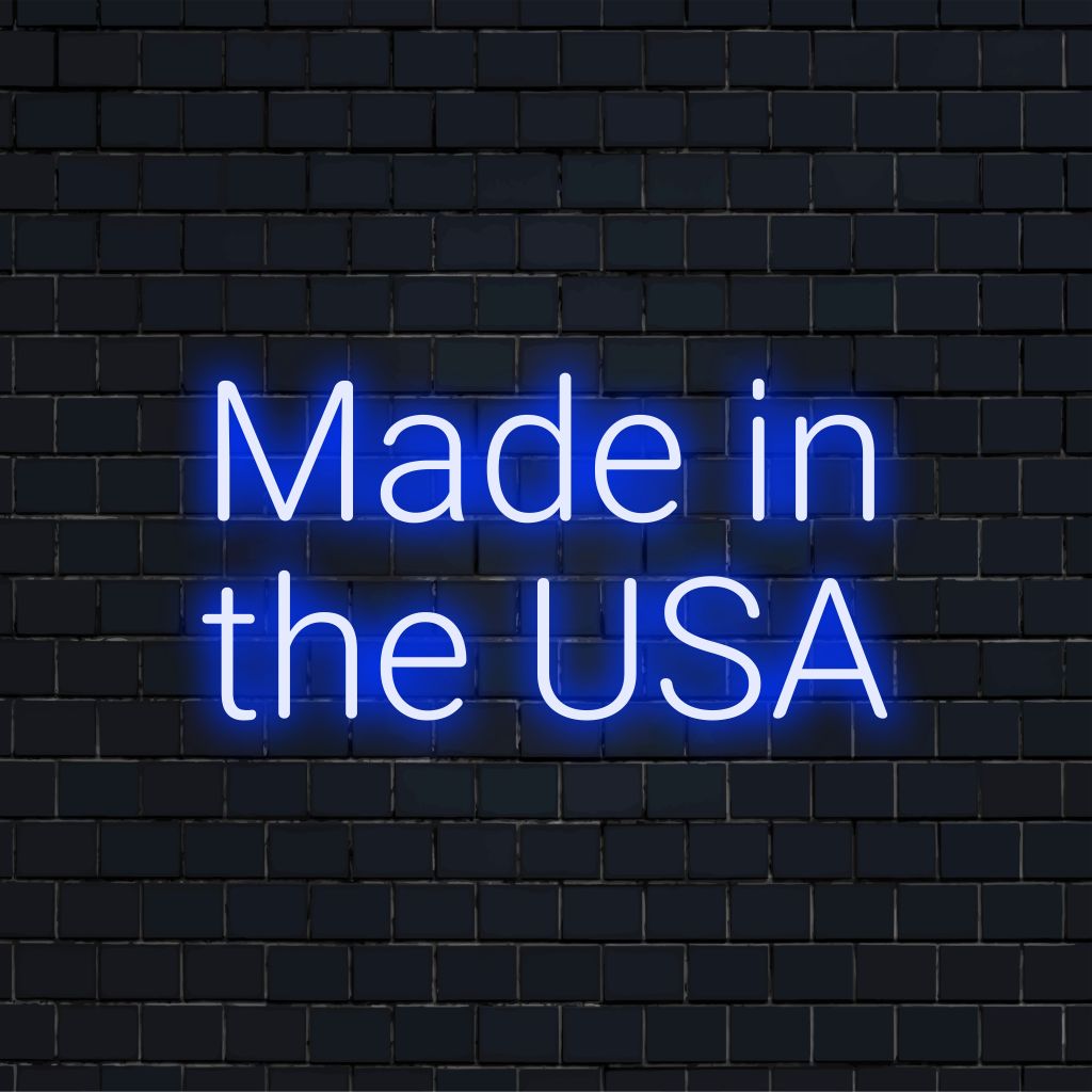 Made In The Usa Neon Light with glowing wall decor against brick backdrop