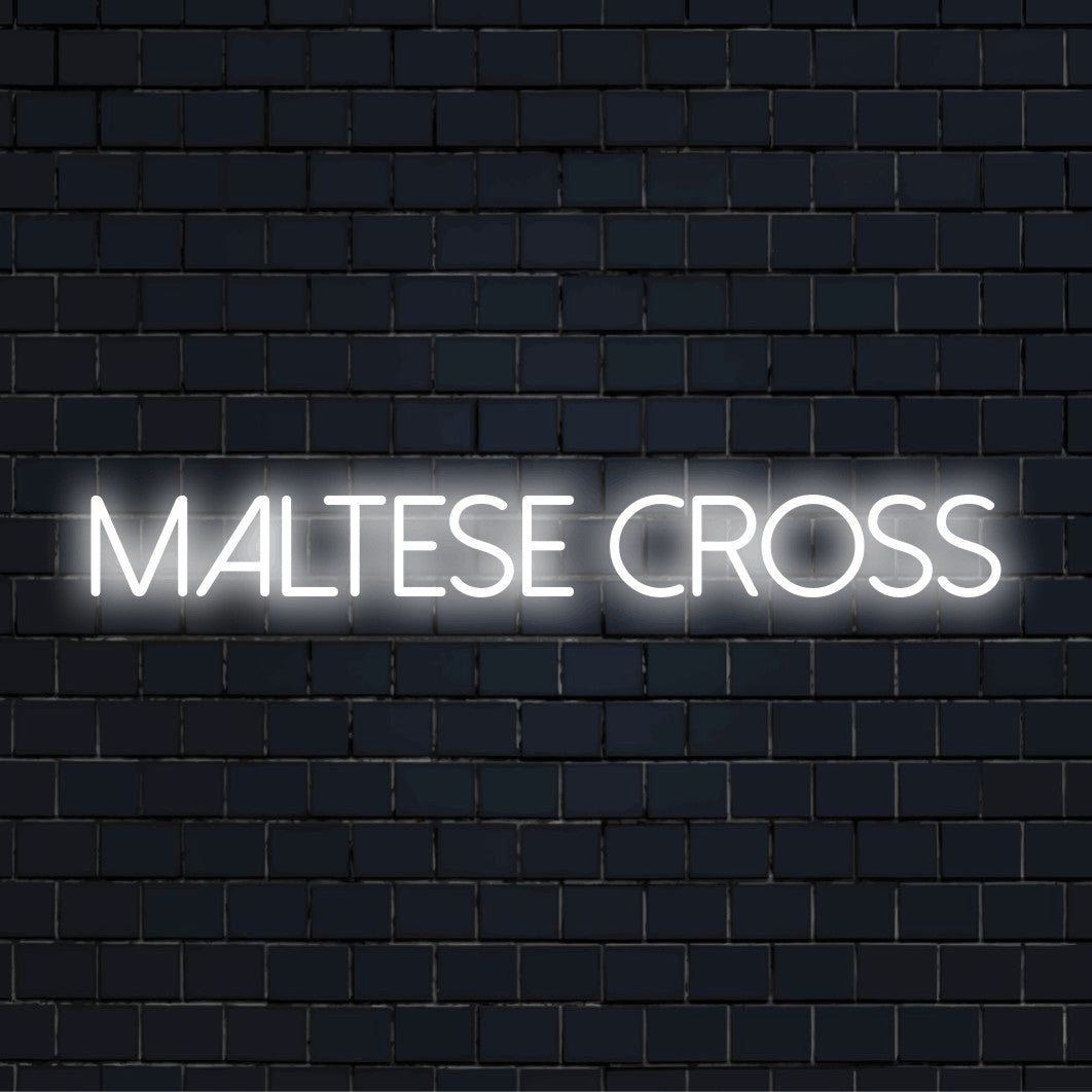Maltese Cross Neon Light with bright neon lettering on black brick background