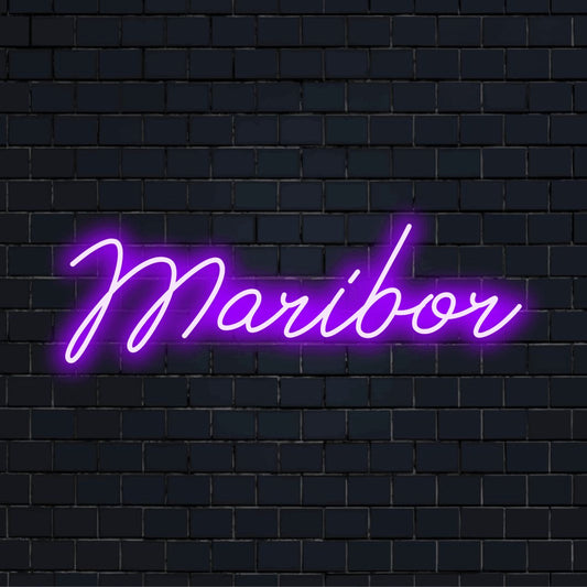 Maribor Neon Light with glowing neon text on dark brick background