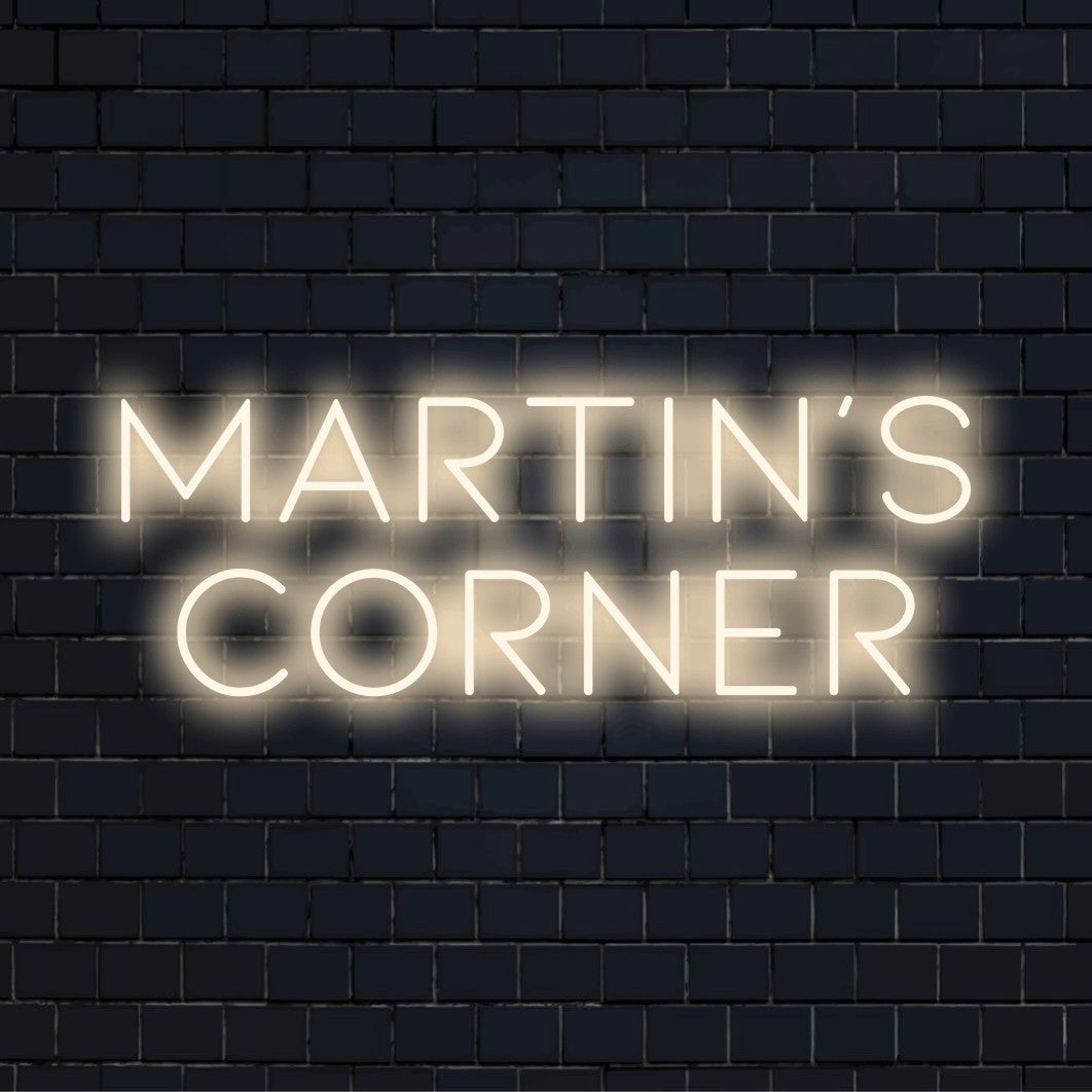 Martin_s Corner Personalized LED Neon Sign, glowing lettering on dark brick background