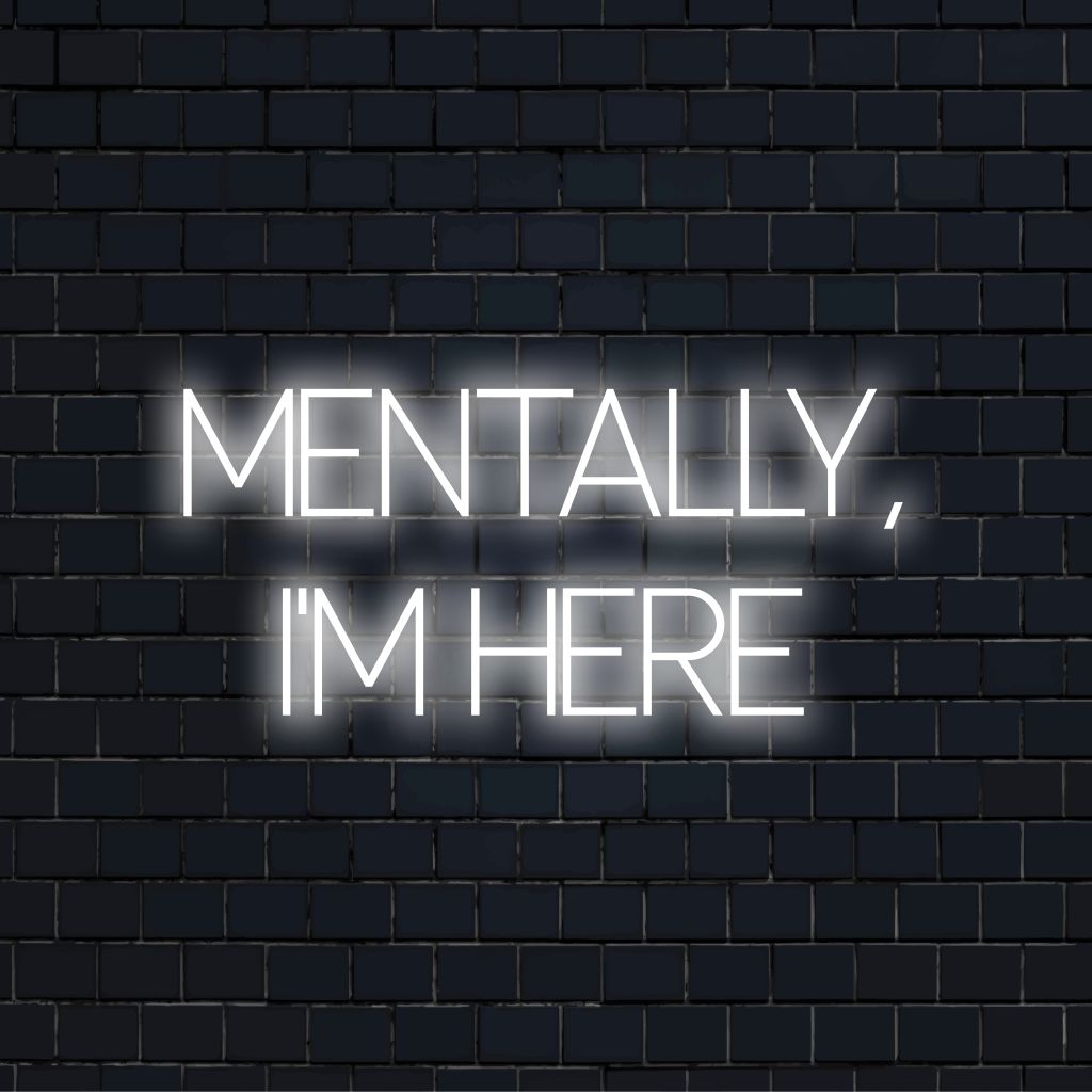 Mentally Im Here Neon Sign, bright LED glow against black brick wall